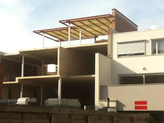 construction maison ossature bois haute densité